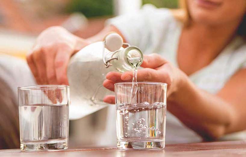 Pouring a glass of water