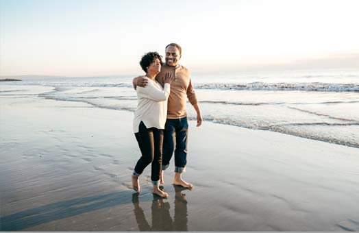 Couple walking on abeach