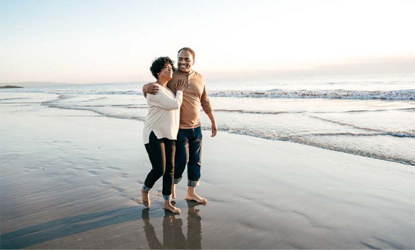 Couple walking on a beach