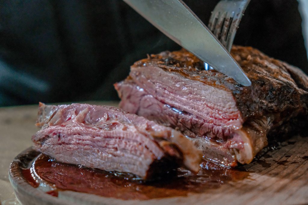 Brisket of beef being sliced