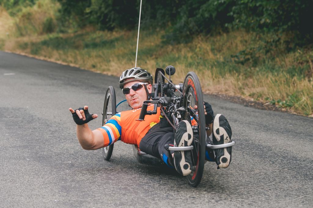 Andy Adamson riding his hand bike.