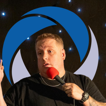 Louie Green talking into a microphone
