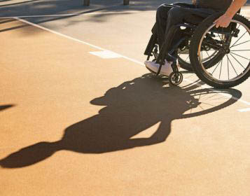 Man playing sport in a wheelchair